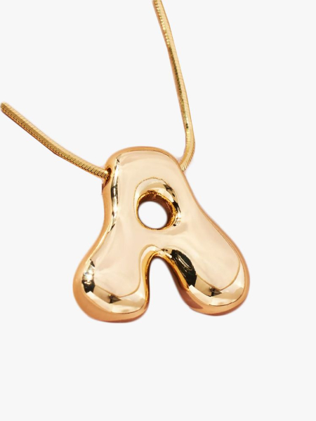 Anthropologie Bubble Letter Monogram Necklace in branded component on a light gray background